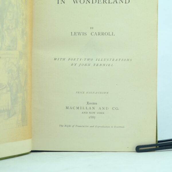 Alice in Wonderland and Through the Looking Glass 1st People's editions by Lewis Carroll